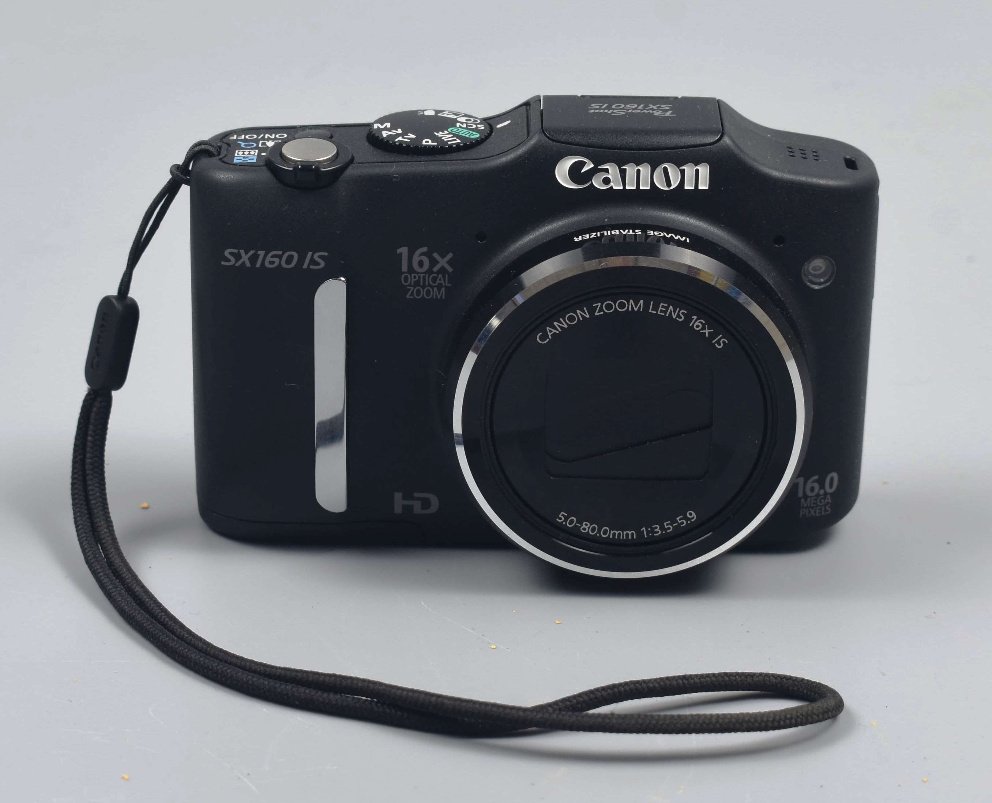 Речі. Фотоапарат "Canon SX160".
